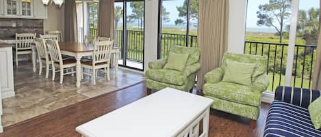 Dining room/living area with a direct oceanfront beautiful view. Seating for 8.