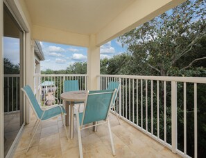 Balcony - Outdoor Dining + Pool Views