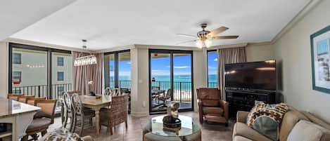 Spacious Living and Dining Areas with Balcony Access