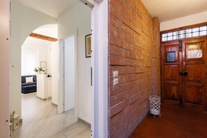 View of the building entrance and of the apartment entrance.