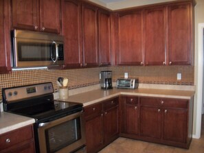 Beautiful Kitchen! Well Stocked! Plenty of space for our long term guests. 