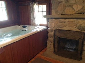 Hot tub and fireplace