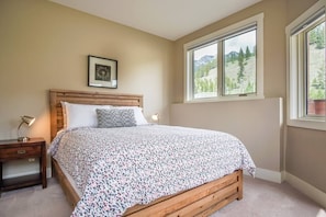 Queen bed in master bedroom