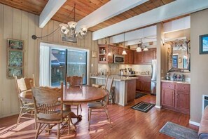 Easy serving to dining table from this open space