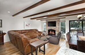 Large, comfy, sectional sofa in front of the fire