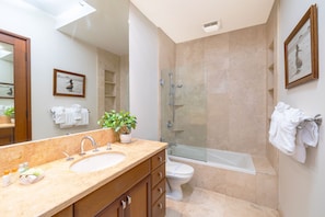 The full bathroom has a tub/shower combination!