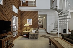 Spiral staircase to upper level