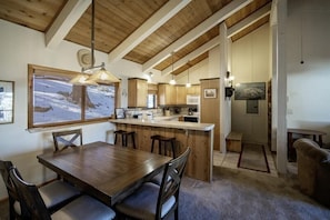 Easy serving to dining table from this open space