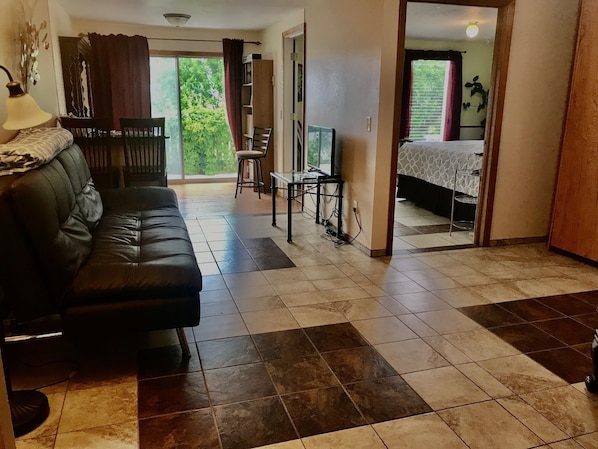 Living area with a Double Futon Leather couch
