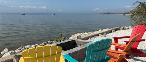 Seating by pier with fire pit
