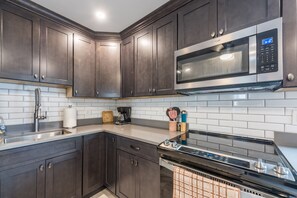 Beautiful gourmet Kitchen with chef faucet.