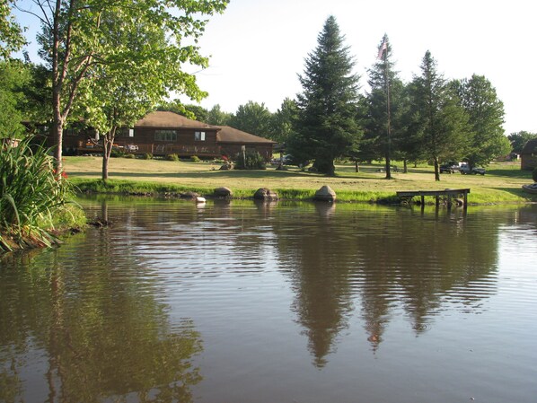 View of log home from pond