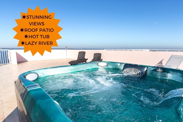 Relax in our huge, private roof top patio of this penthouse overlooking the bay!