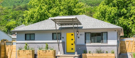 You Won't Miss the Bright Yellow Door on Mid Century Modern! 