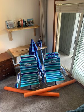 NEW July 12. Tommy Bahama backpack beach chairs, umbrella and XL pool noodles.