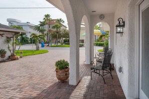 Just relax outside your door and watch the beach goers!