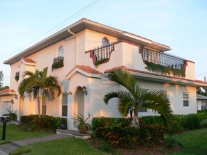 Front side of the house located on a corner lot for privacy.