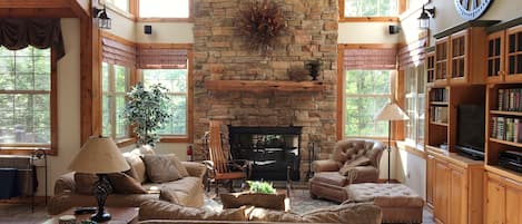 Two-Story Great Room with Wood-Burning Fireplace and Entertainment Center