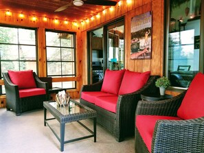Enjoy the Lake views & Comfort from your 3 Season Room.
