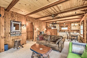 Have a seat on the couch to read a book after a long day on the lake.