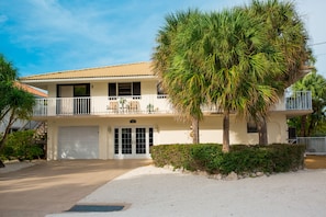 Front of our home with wrap-around deck on 2nd floor.