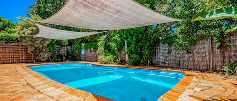 Good sized pool with 3 steps, very private on a corner block of land.