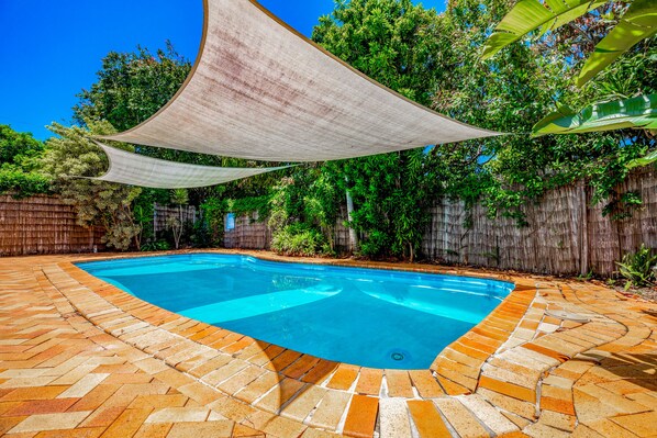 Good sized pool with 3 steps, very private on a corner block of land.