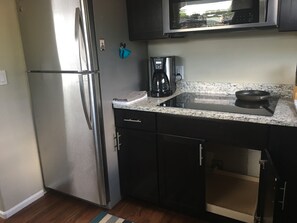 Fully kitchen .. Fridge has ice maker, Coffee Maker  & complementary coffee, Tea