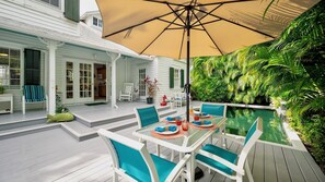 Enjoy an outdoor meal in the shade under the umbrella...