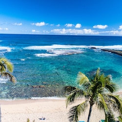 View of the sandy beach and ocean in front of the Villas! - a great place for snorkeling and building sandcastles!