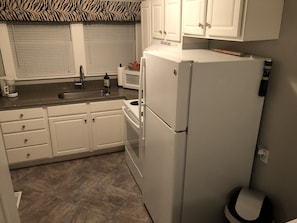 Kitchen stocked with items great for a short or a long-term stay!