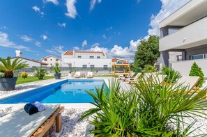 Pool and garden area, view on the pool