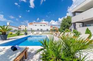 Pool and garden area, view on the pool