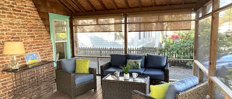 Comfortable porch furniture (please notice ceiling fan with light)