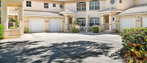 SW4-105 - Covered and gated, private entry to the front door and attached garage to the left