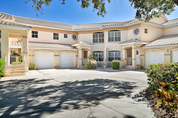 SW4-105 - Covered and gated, private entry to the front door and attached garage to the left