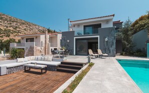 Swimming Pool and Sitting facilities next to the pool - Dining table