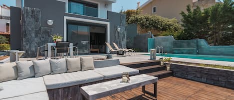 Swimming Pool and Sitting facilities next to the pool