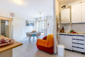 The living room with open plan kitchen