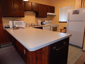 StayWinterParkBeaverVillageCondos kitchen unit 1932