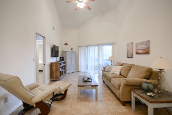 Updated living area. Large flat screened TV sliders lead out to the veranda.