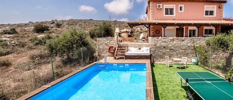 Private pool and enclosed garden with table tennis.