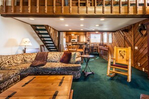 Living Room / Flat Screen TV / DVD Player / Wood Burning Fireplace / Queen Sleeper Sofa
