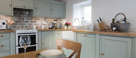 Hand crafted country kitchen, oak wood flooring and underfloor heating.