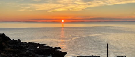 Sunsets are spectacular from your private deck looking over Conception Bay.