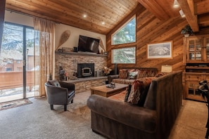 Living Room / Flat Screen TV / Wood Burning Fireplace