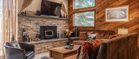 Living Room / Flat Screen TV / Wood Burning Fireplace