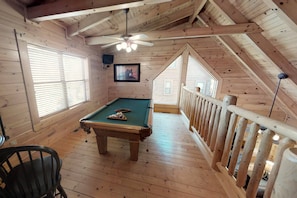 Pool table located in the loft for some quality downtime with family and friends.