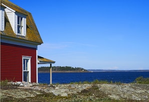 The 100 year old Red House sits at the head of Mackerel Cove on Bailey Island.