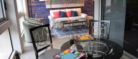 Enjoy the beach style condo and art mosaic piece showing the sunset on the beach
